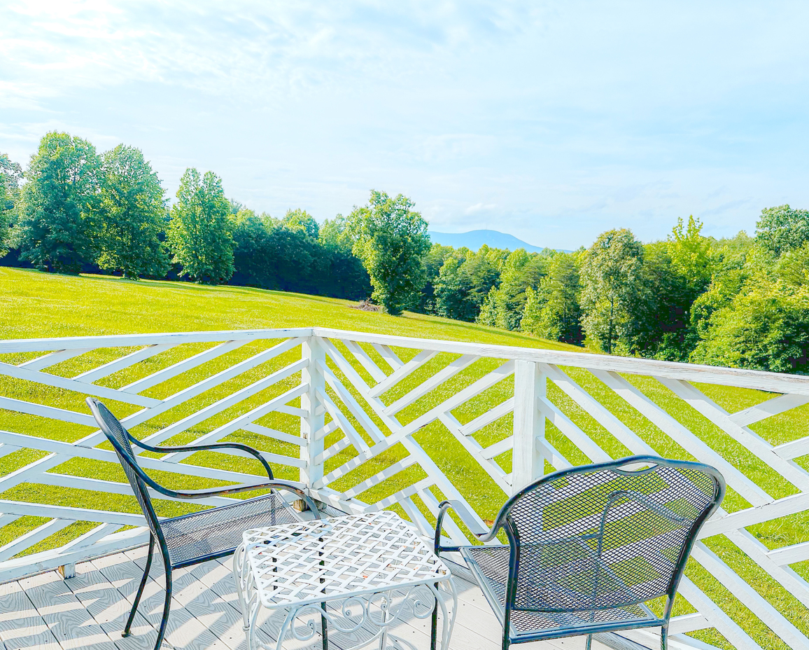 Image of the private porch off of the bedroom of the Carriage Bay Cottage.