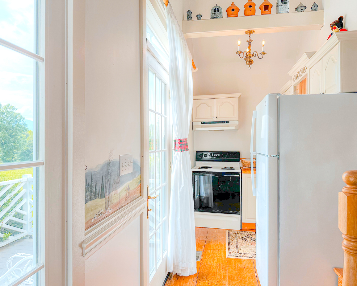 Zoomed out image of the kitchenette in the Carriage Bay Cottage.