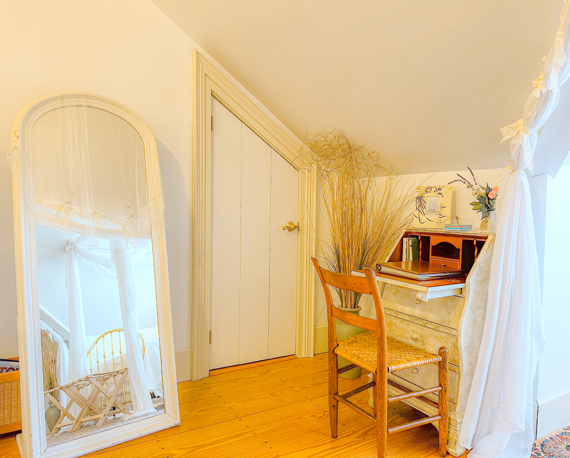 Desk area and full length mirror in the Croft Room.