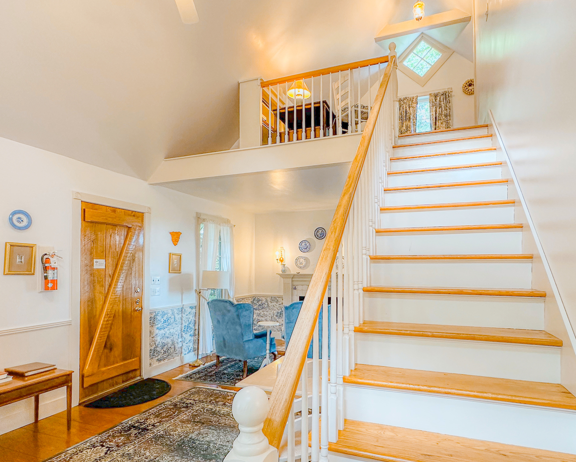 First image of the staircase leading to the upstairs loft of the Hayloft Cottage.