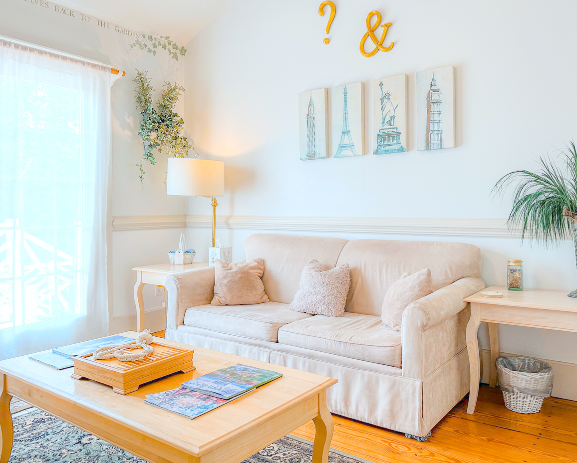 First image of the couch sitting area in the Springhouse Cottage.