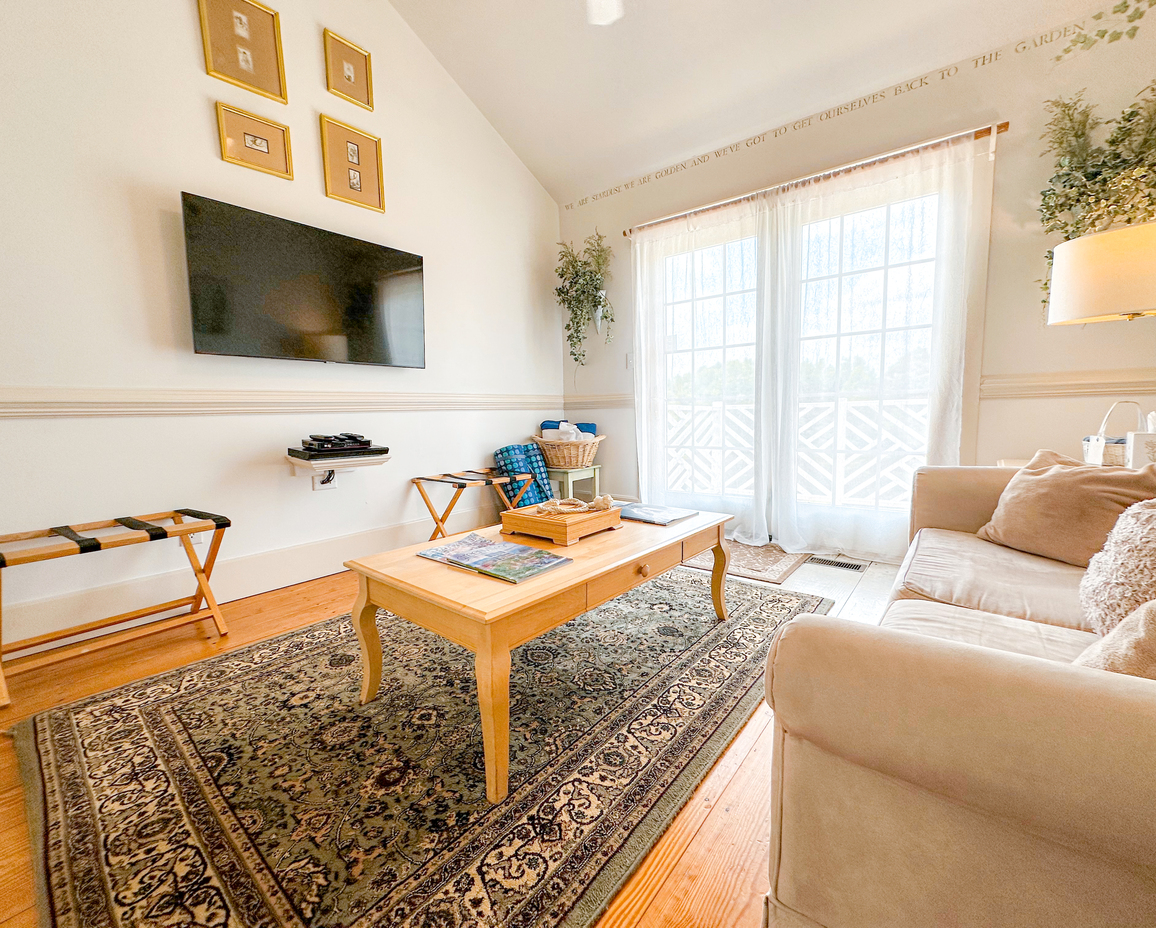 Second image of the couch sitting area in the Springhouse Cottage.